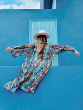 Load image into Gallery viewer, KIMONO with animal print, color blue grey zebra inspired by nature, sustainable fabrics styled with hat and white boots perfect for summer and spring
