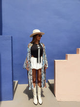 Load image into Gallery viewer, KIMONO with animal print, color blue grey zebra inspired by nature, sustainable fabrics styled with hat and white boots perfect for summer and spring
