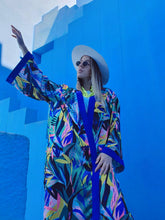 Load image into Gallery viewer, KIMONO WITH FLOWERS AND LEAVES ,COLORFUL PERFECT FOR SUMMER DAYS OR FOR PARTIES, medium lenght shot in Muralla Roja, Spain
